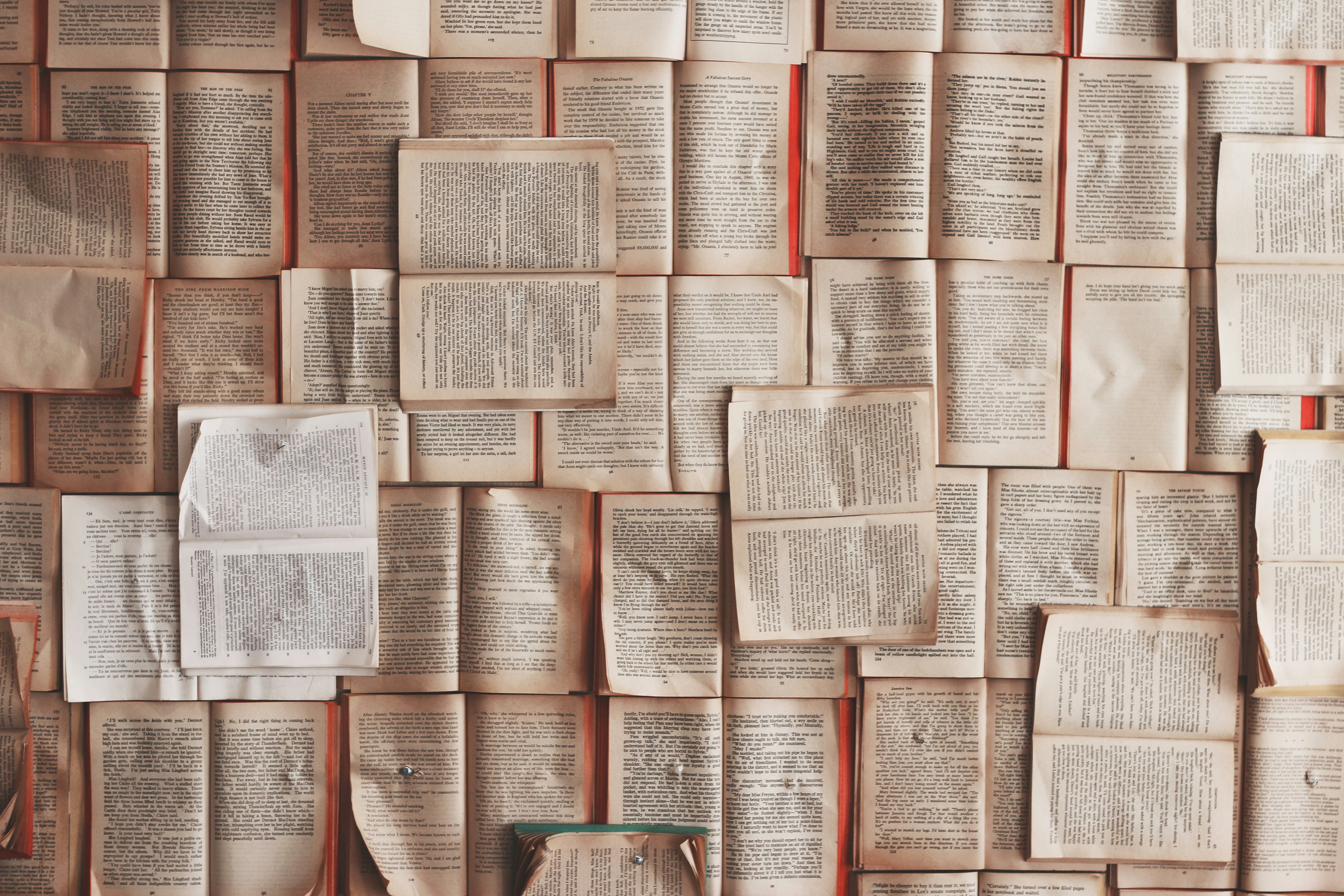 A table full of open books