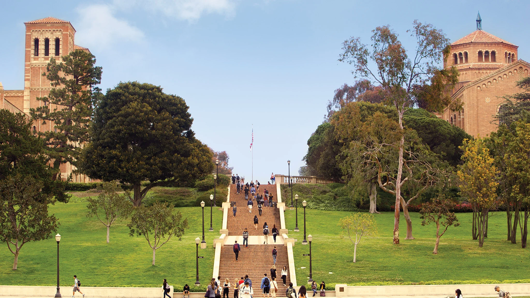 A group of people walking up a staircase